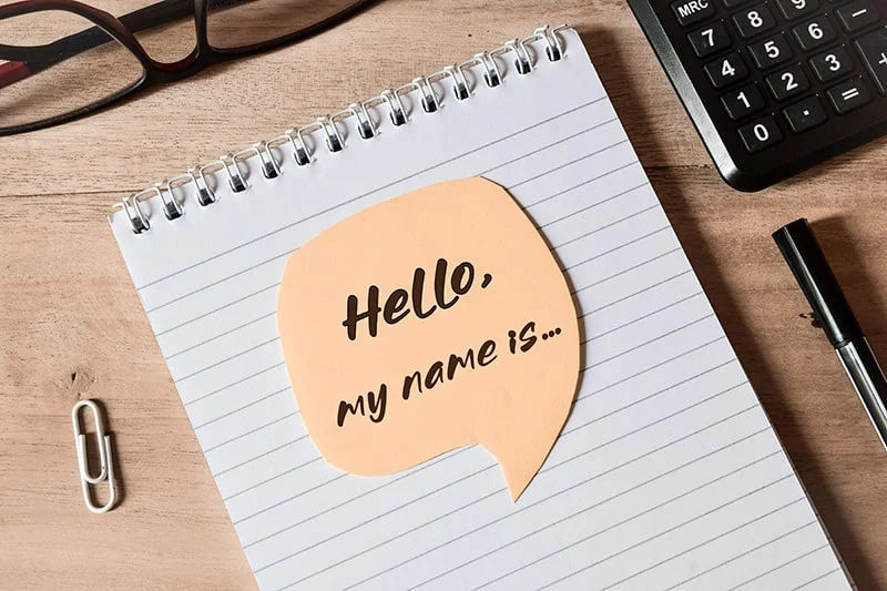 Notebook with a 'Hello, my name is' note