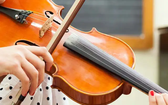 Student playing the violin